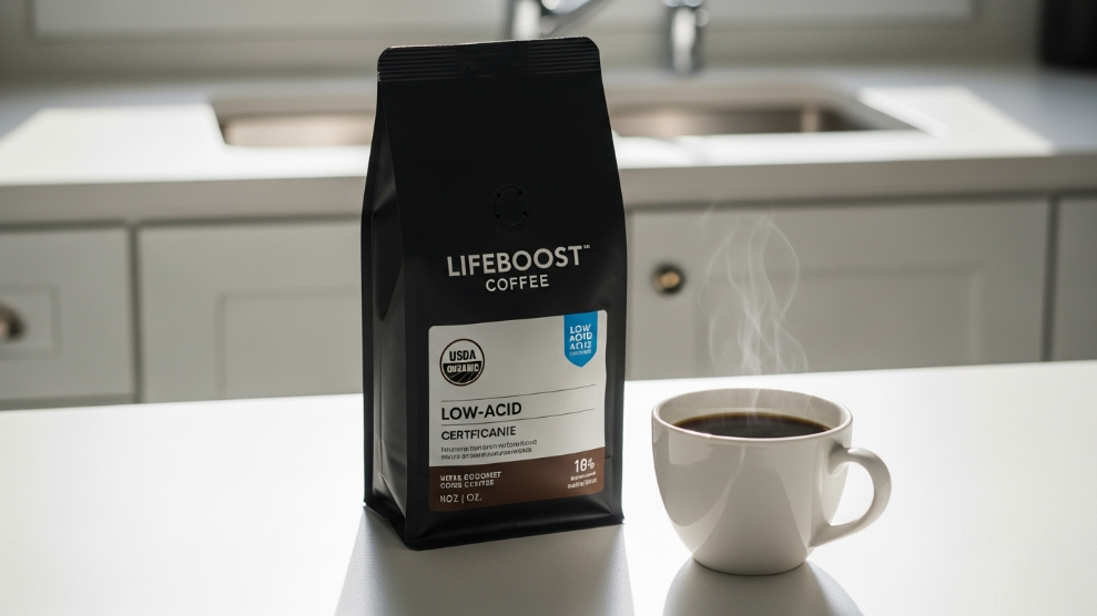 Lifeboost Coffee bag showing single origin Nicaragua low acid organic USDA certified label on a white kitchen bench