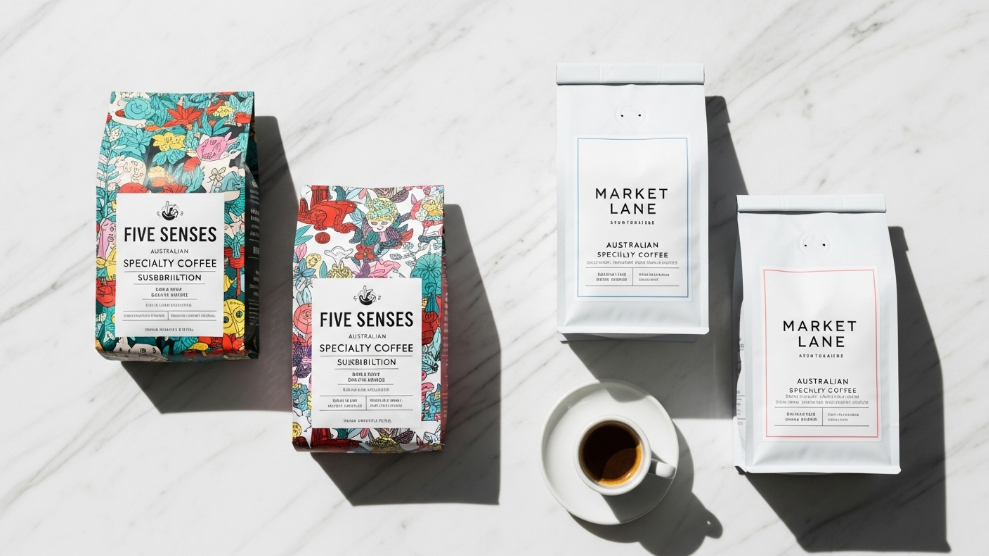 Five Senses and Market Lane specialty coffee subscription bags from Australian roasters on a clean white surface