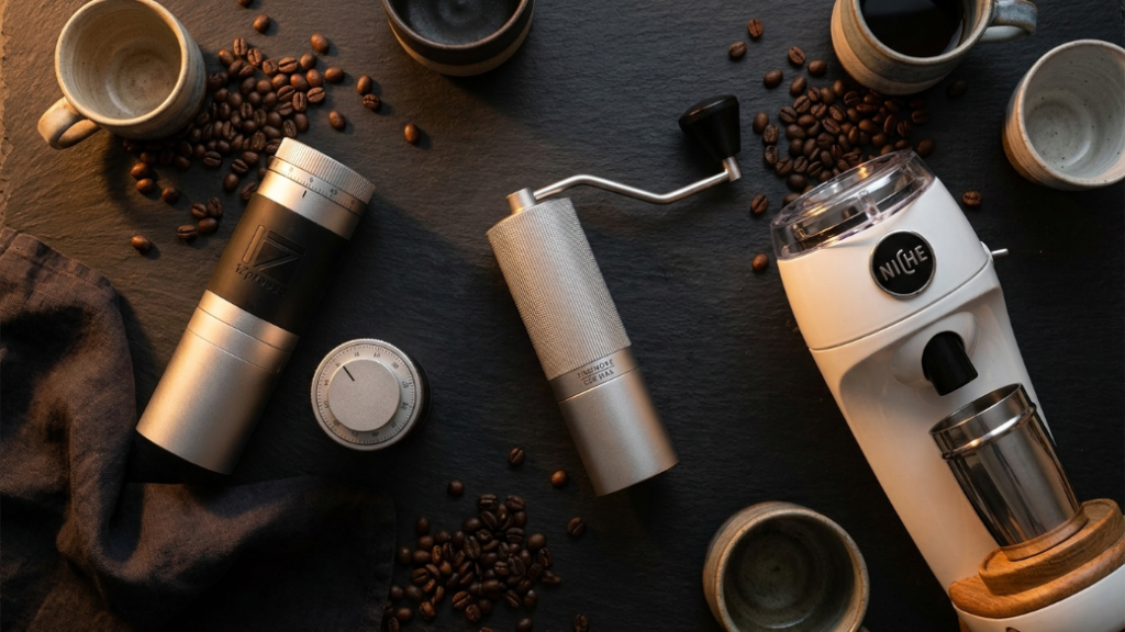 Premium coffee grinder gifts for snobs showing 1Zpresso JX-Pro S manual grinder in silver TIMEMORE Chestnut C3S MAX in silver and Niche Zero single dose electric grinder in white as the best grinder gifts for serious coffee drinkers and home baristas