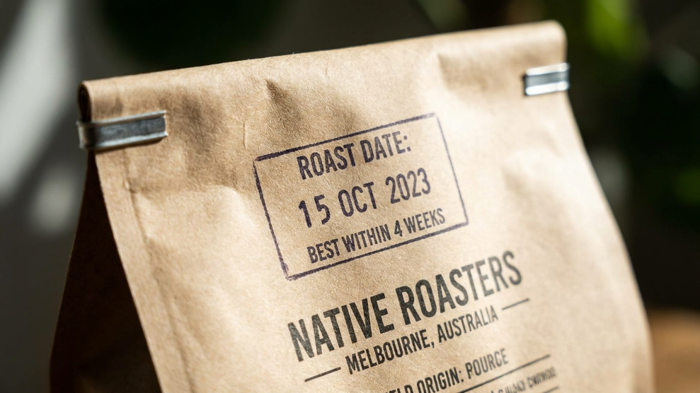 Close-up of a specialty coffee bag showing roast date printed on the bag as the key freshness indicator for Australian buyers