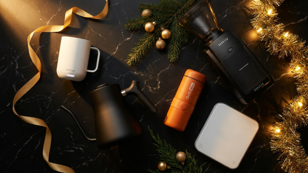 Luxury Christmas coffee gifts over 100 dollars showing Ember Smart Mug 2 in white with temperature display Fellow Stagg EKG gooseneck kettle in matte black Baratza Encore ESP electric burr grinder in black OutIn Mino portable espresso maker and Acaia Pearl scale as luxury Christmas gifts for serious coffee lovers